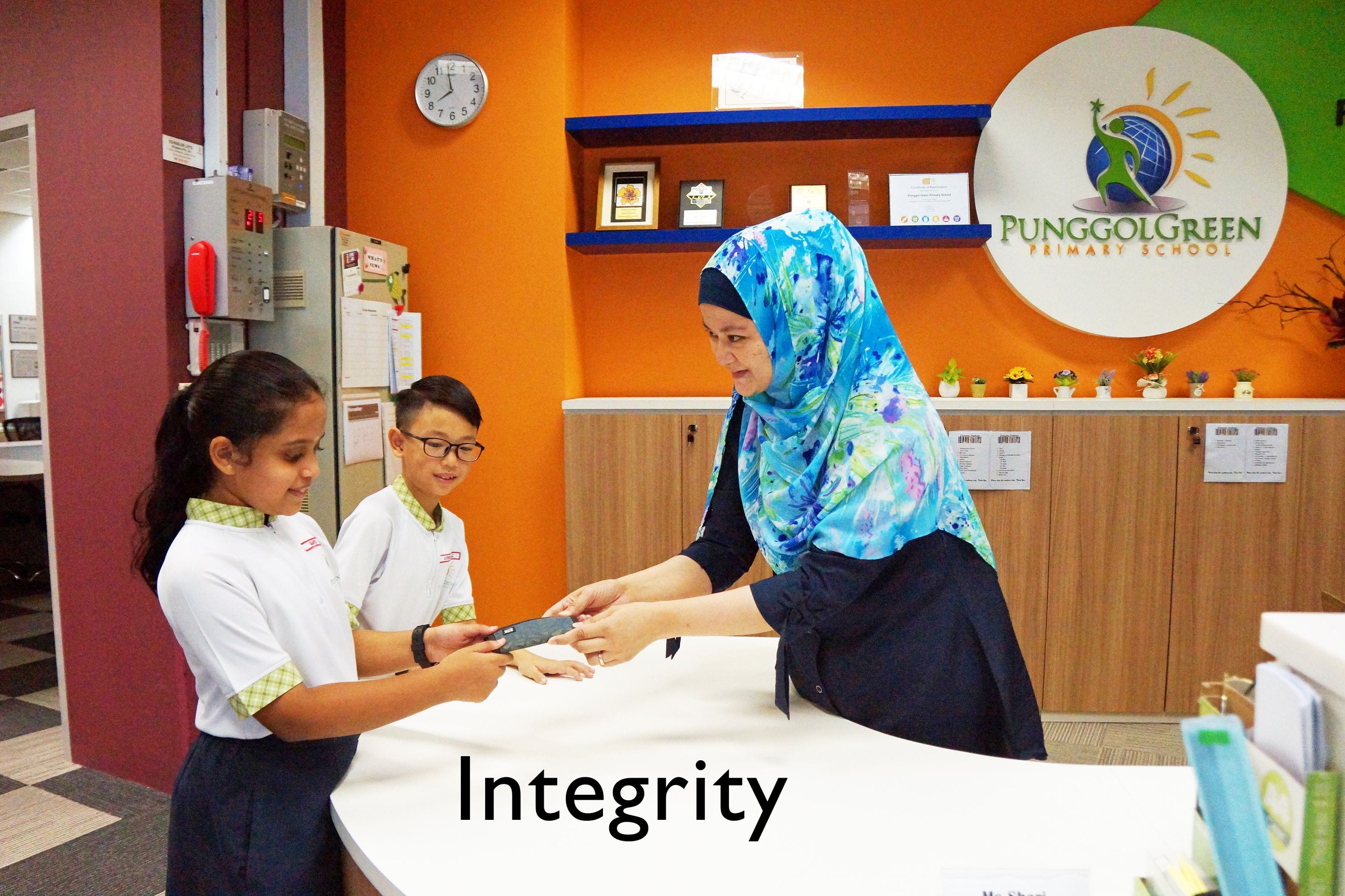 Students demonstrating one of the school core values "Integrity"
